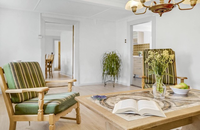 On a large plot with garden awaits you this cozy former homestead.