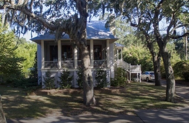Our Beach House with a pool. Beach walks steps away or relax with a beach view.