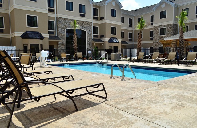 Outdoor Pool. Free Breakfast. Gym. Near Camp Gelger & Camp Johnson.