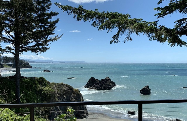 Pacific Edge Oceanfront Luxury Home with staircase to secluded sandy beach