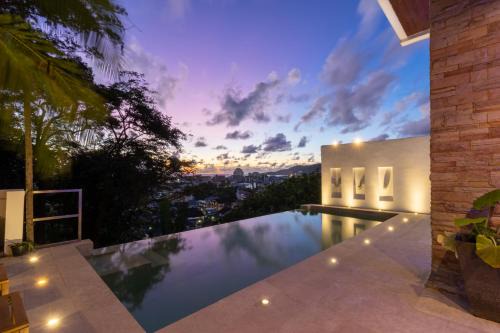 Patong 180-degree stunning sea view modern 4-bedroom villa sleeps 10 private pool stunning sunset BBQ