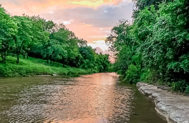 Peaceful riverfront home with enclosed yard - walk to the river