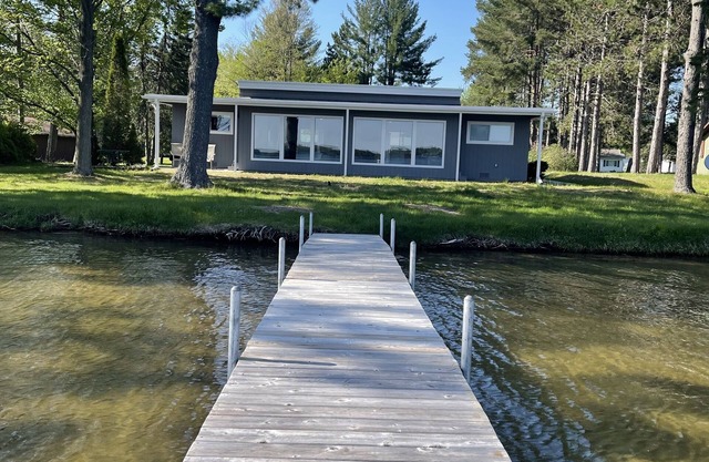 Perfect location on East Twin Lake, walking distance to town! Unit #1