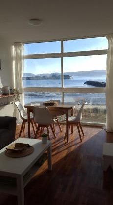 Piso primera línea de playa y vistas al mar en Cariño