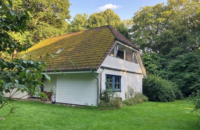 Pond house with loggia on an old estate in the middle of Rügen