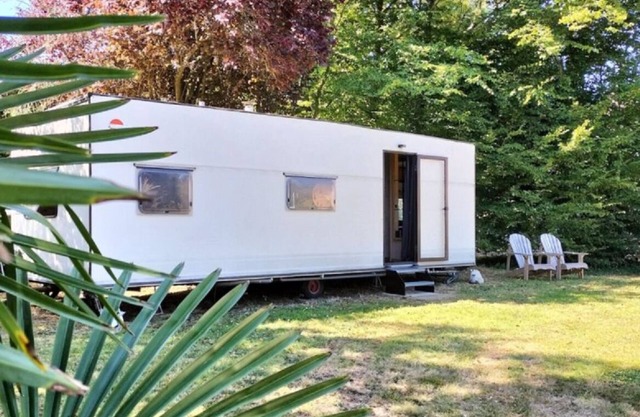 Pond-side mobile home with private indoor pool, D-Day beaches.