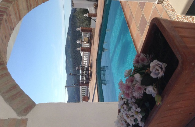 pool side apartment with a large luxury private roof terrace