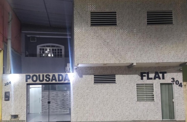 Pousada Quarto com tv,ar,frigobar,wifi e garagem