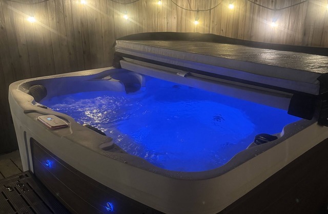 PRIVATE HOT TUB! Stunning updated downstairs home- Amazing Location