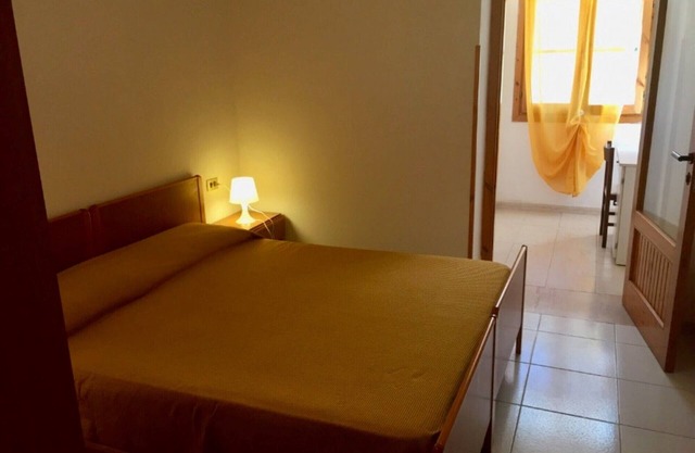 Property in a Holiday Village 'Baia Falcone - Standard 301' with Sea View and Air Conditioning