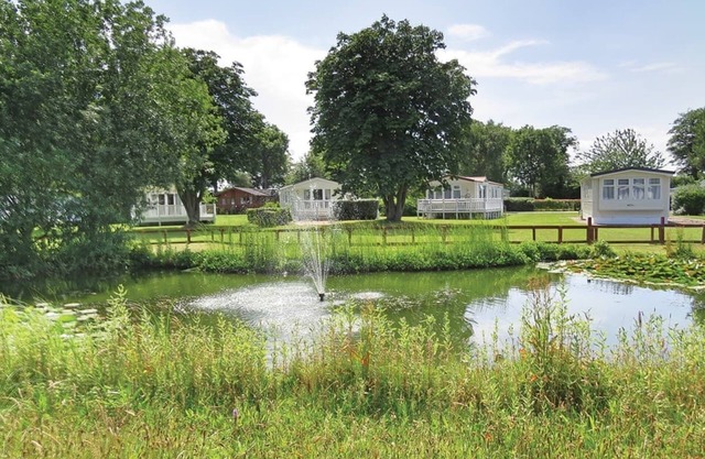Quality 12ft-wide caravan with one double and one twin.