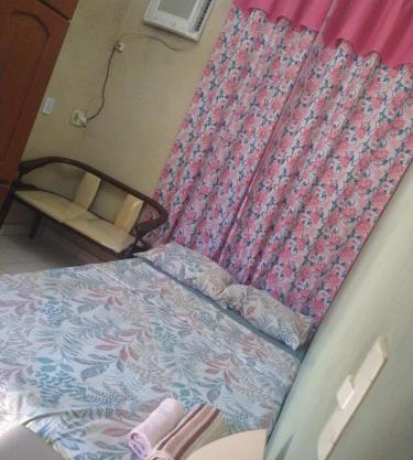 Quarto em casa compartilhada