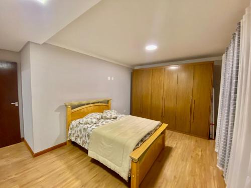 Quarto para locação em apartamento