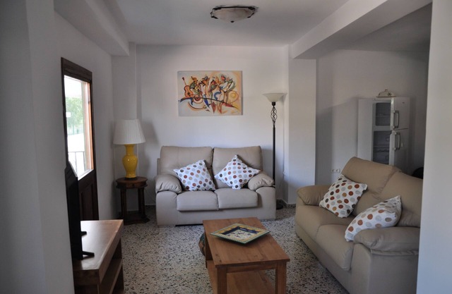 Recently renovated 2 bed townhouse with a large roof terrace in Orgiva town.