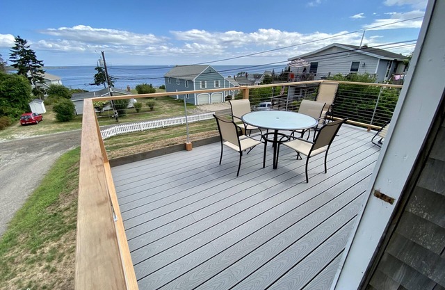 Recently updated cottage featuring beautiful easterly views of Casco Bay