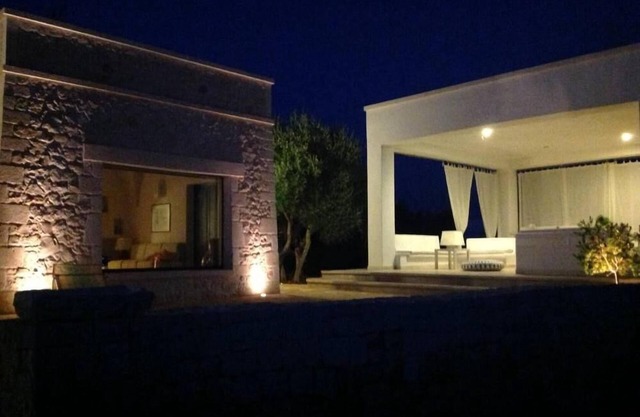 Refined house with a large patio overlooking the expanse of olive trees, outdoor stereo system