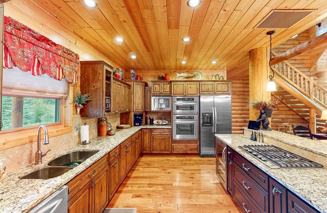 Reids River Retreat | Waterside cabin in Almont with deck, grill, & river access