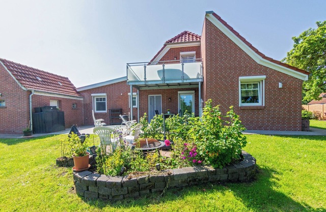 Relax in the wheelchair-friendly Huus op de Wurf in Dornumergrode