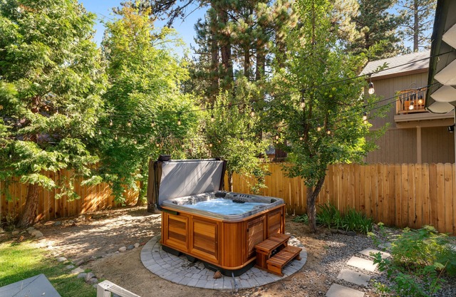 Relaxing dog-friendly home with fireplace, hot tub, patio, game room, & W/D