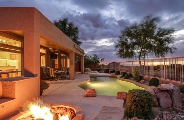 Resort home On golf course with heated pool/Jacuzzi, out door tv & City views