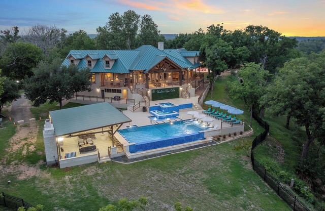 Resort with 50 foot Infinity Edge Pool, Hot Tub, Sports Courts, and More!