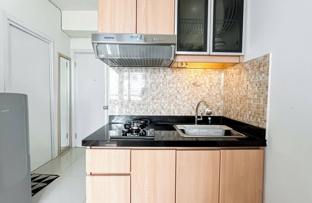 Restful And Homey 2Br At Green Pramuka City Apartment