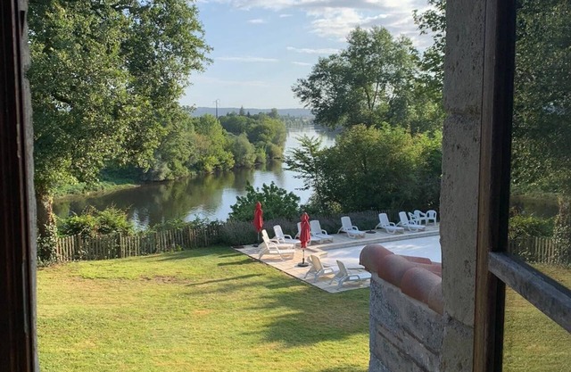 Restored Farmhouse with stunning river views, private pool and games room
