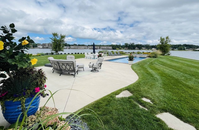 Retreat on the point of Pine Lake with your own pool/ hot tub.