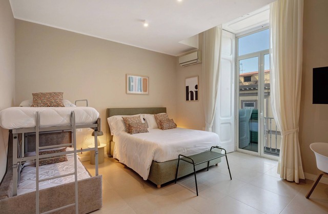 Room 'Family Vista Citta' with Balcony, Wi-Fi and Air Conditioning