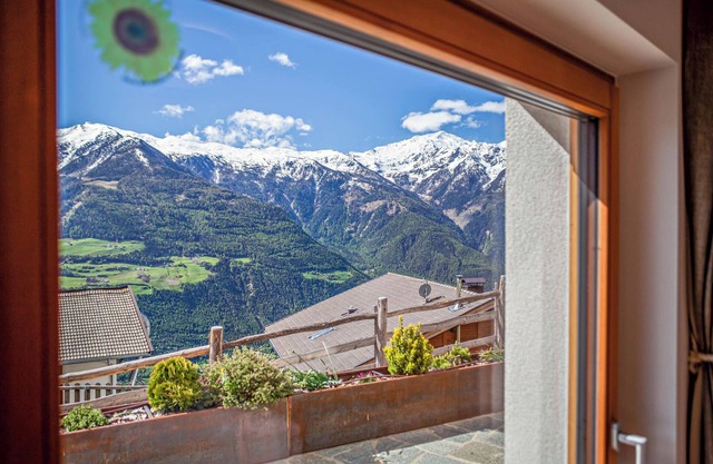 Rustic Apartment Vermoi on Mountain Farm with Terrace