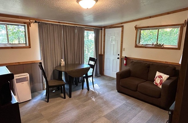 Rustic cabins in secluded campground with lake access and woods to wander in.