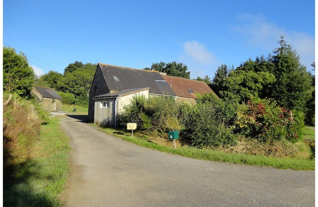 Rustic stone house in pretty surroundings.