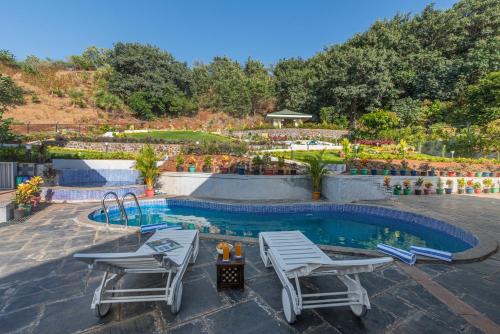 SaffronStays Caramelo - a private heated swimming pool villa with Jacuzzi nestled amidst beautiful landscaping and gardens in Lavasa