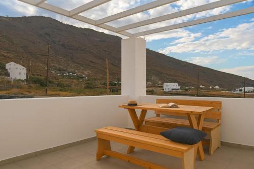 Santorini's Old Mill Serene Getaway by Pori Beach