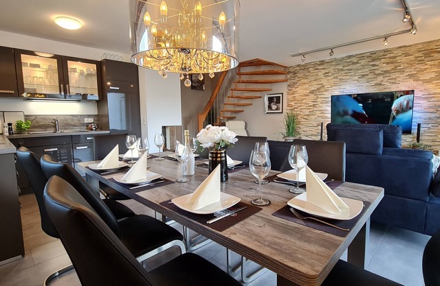 Seevilla Monaco at the Fleesensee with fireplace, sauna 38 degrees outdoor whirlpool in the garden