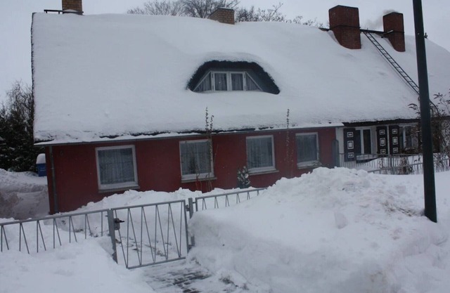 Semi-detached house with fireplace near the Bodden, central but quiet location