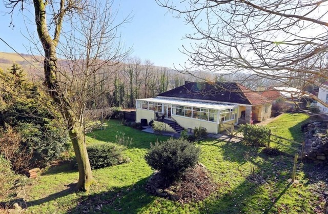 Semi Rural, quirky and spacious, with games room/conservatory and large garden.