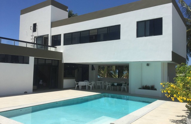 Sensational beachfront home in the best condo in Guarajuba with large pool