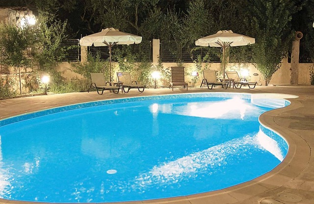 Situated within lush, beautifully maintained gardens, this renovated stone built property is a stunn