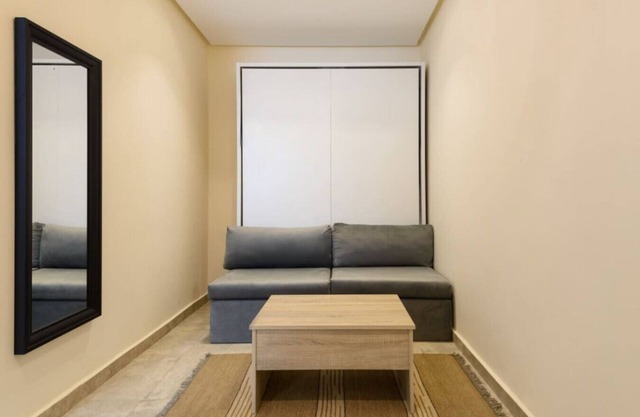 Smart Compact Studio with Convertible Queen Bed , Sofa and Kitchenette and shared community garden