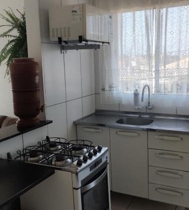 Sobreposta aconchegante na praia