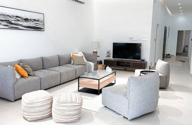 Spacious 3-bedroom apartment in charming As Sifah with WiFi, AC
