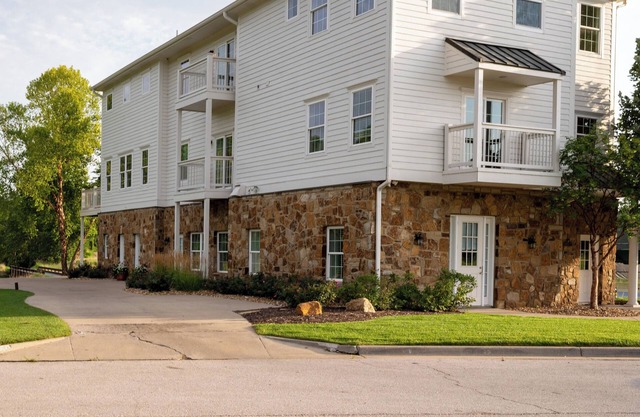 Spacious 4-bedroom/4 bath townhome in fabulous Parkville with golf course views