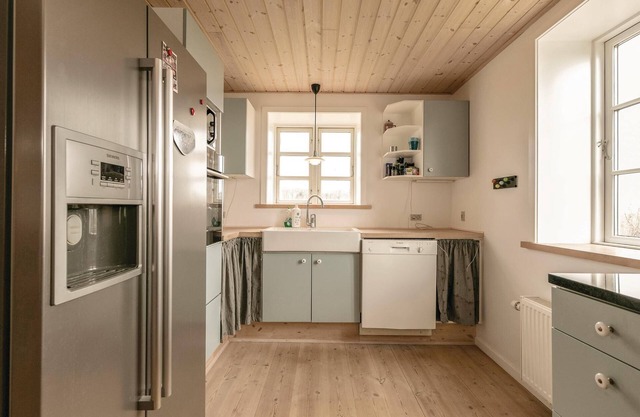 Spacious and modernized vacation home with two floors and sea view.