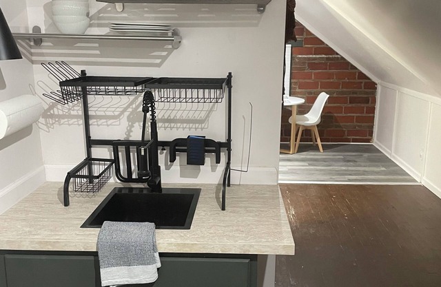 Spacious Third Floor Attic Apartment with and European Charm