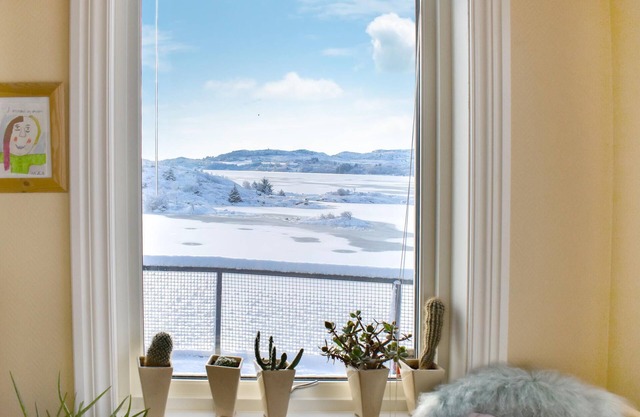 Spend a wonderful vacation overlooking the fjord in this beautiful vacation home with sauna.