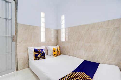 SPOT ON 93035 Karman's Sari Homestay Syariah