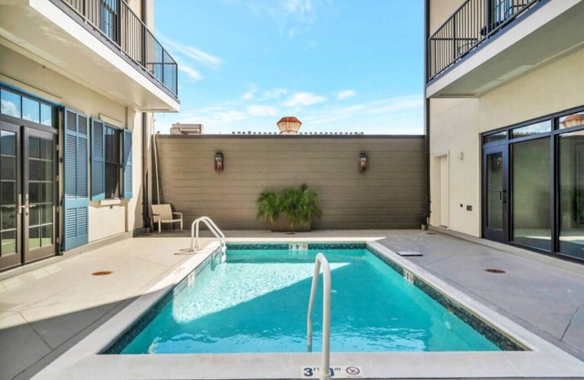 St Charles Ave Condo | Streetcars, Parking, Pool!