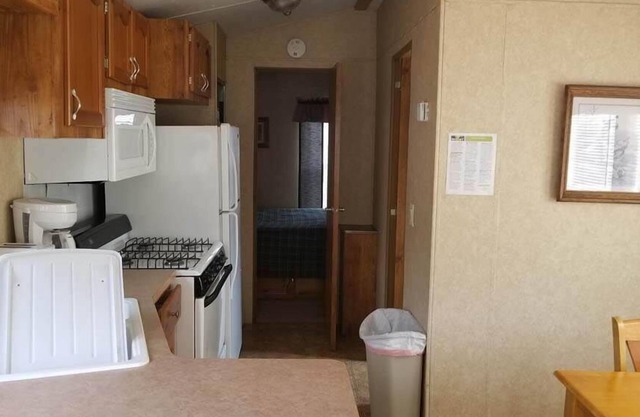 Stay at this quant home perfect for the traveling outdoors enthusiasts not far from Lake Arbutus.