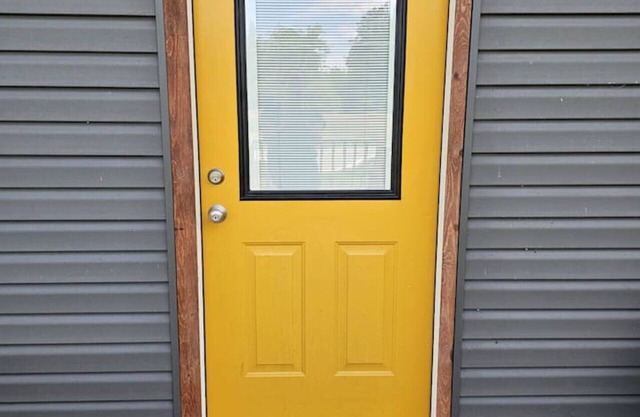 Step Inside the Yellow Door – Your Mountain Chalet Escape Awaits